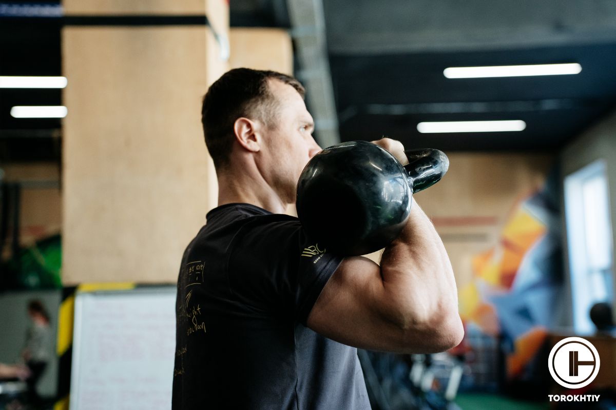 Man improving power with Kettlebell exercises 