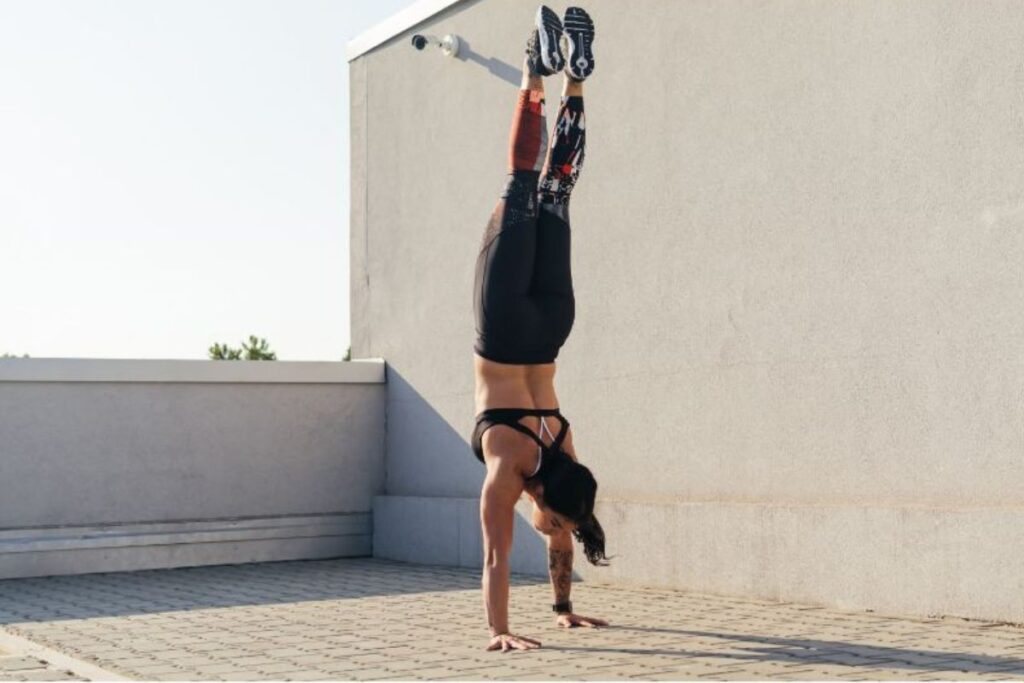woman does handstand