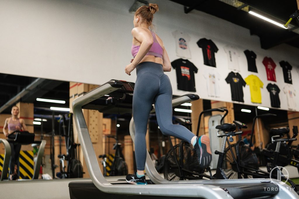female treadmill running