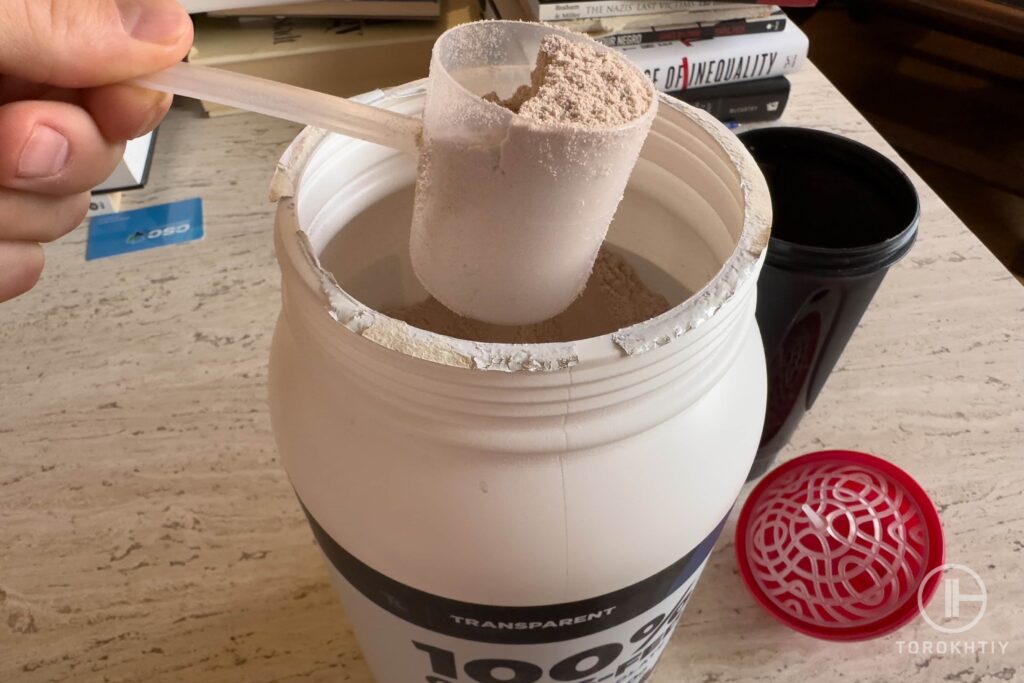 a scoop of tl whey protein