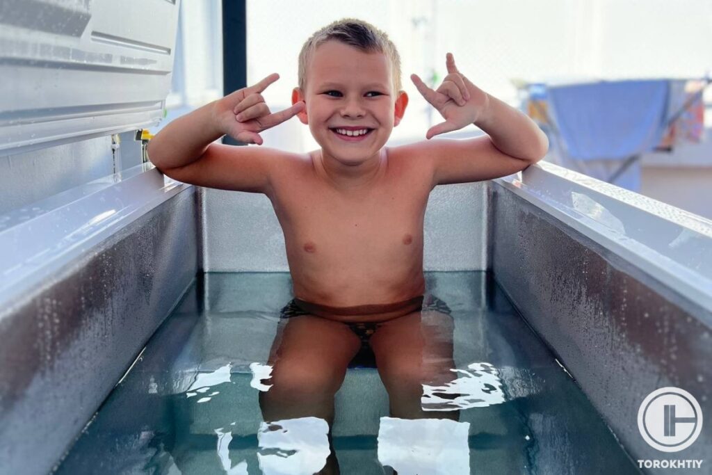 kid taking ice bath