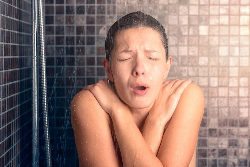 Female Using Ice Shower