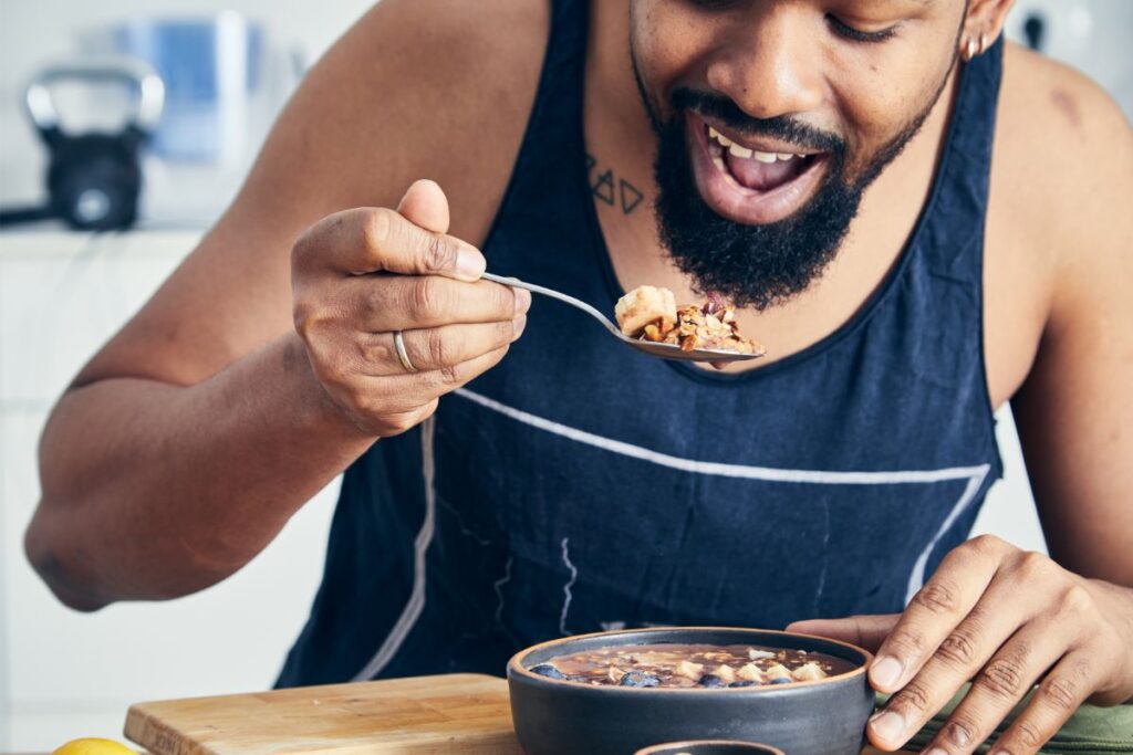 athlete eating oatmeal for breakfast