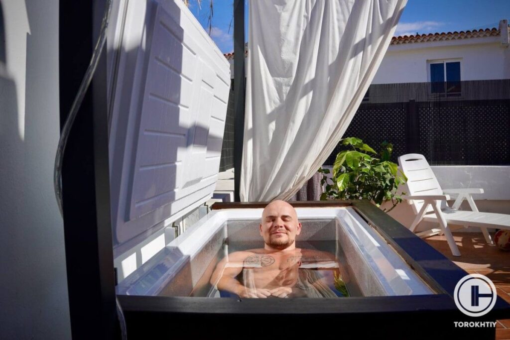 Athlete Relaxing in Ice Bath