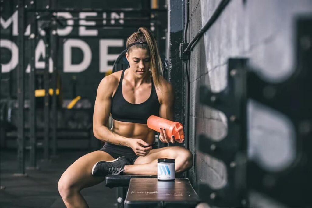 athlete making her pre-workout
