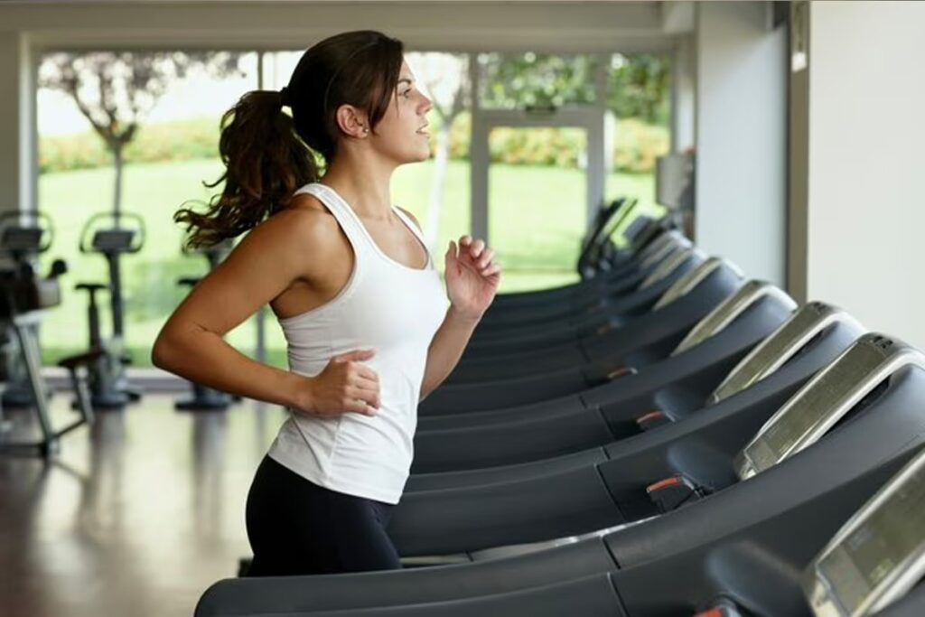 female runner on treadmill