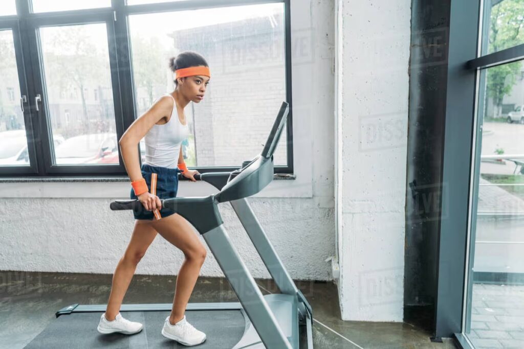 girl running treadmill