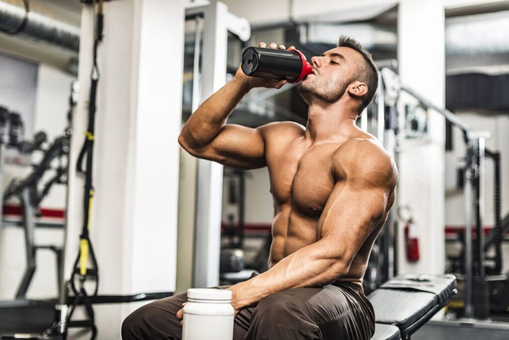 athlete drinking protein