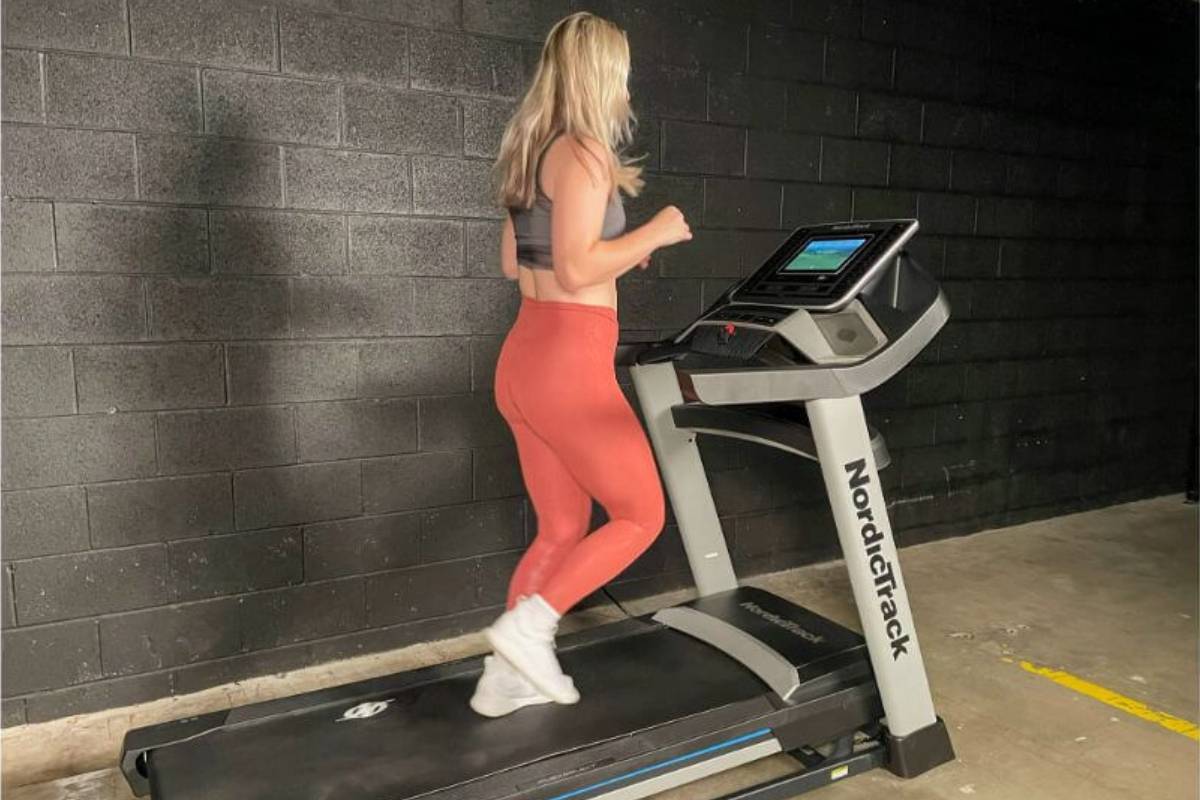 Woman using NordicTrack Treadmill