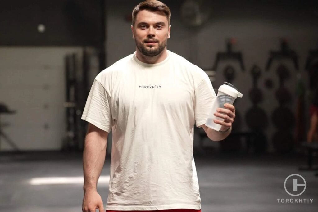 athlete drinks protein