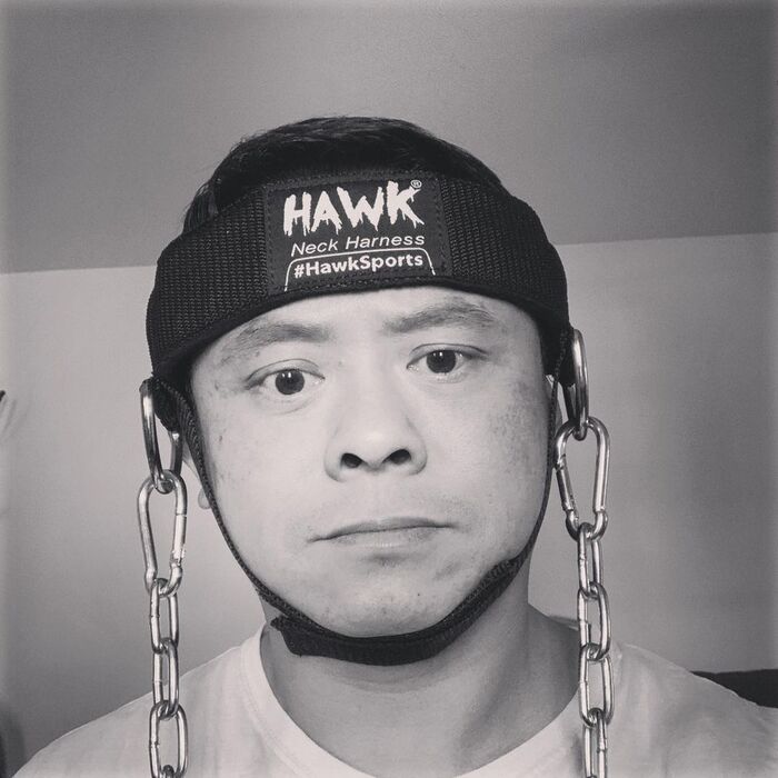 Man wearing hawk neck harness