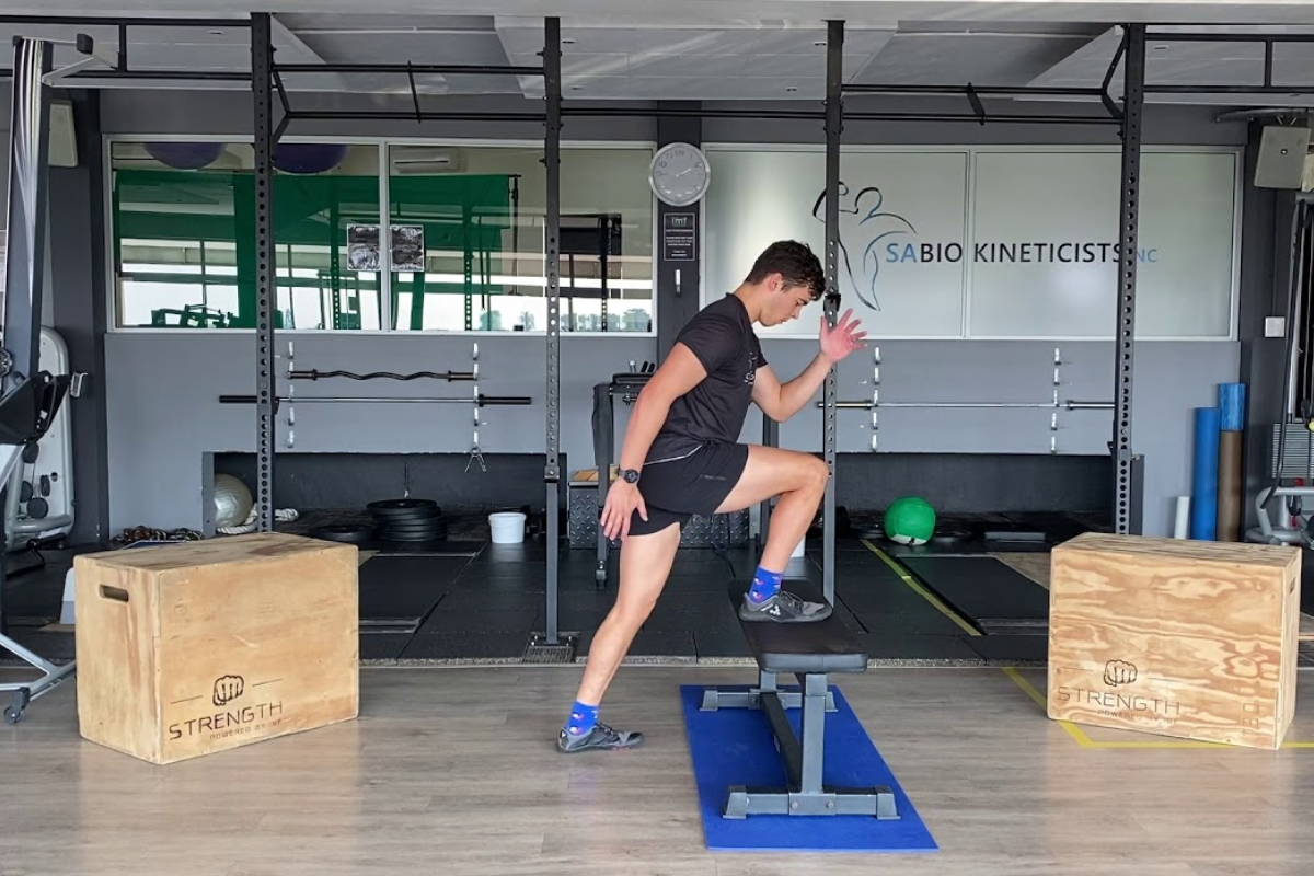 athlete exercising with plyo box step-ups