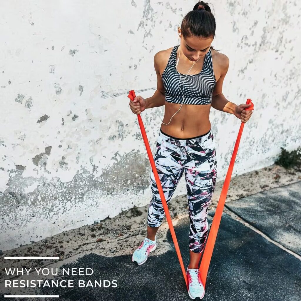woman shows resistance band