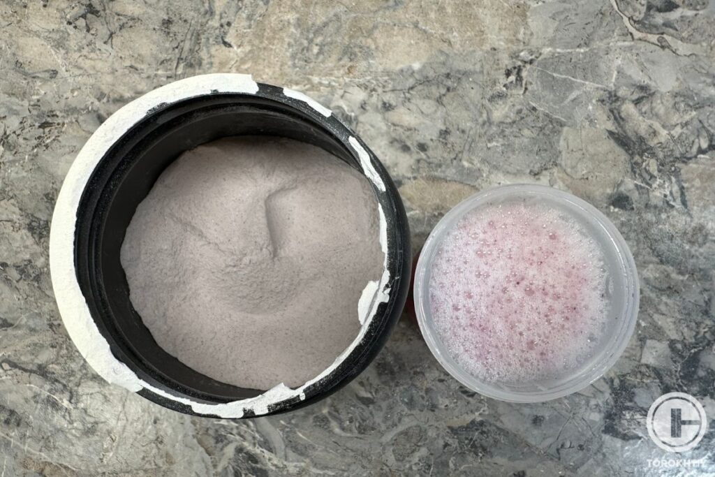 transparent labs pre-work out powder in bottle and in glass of water