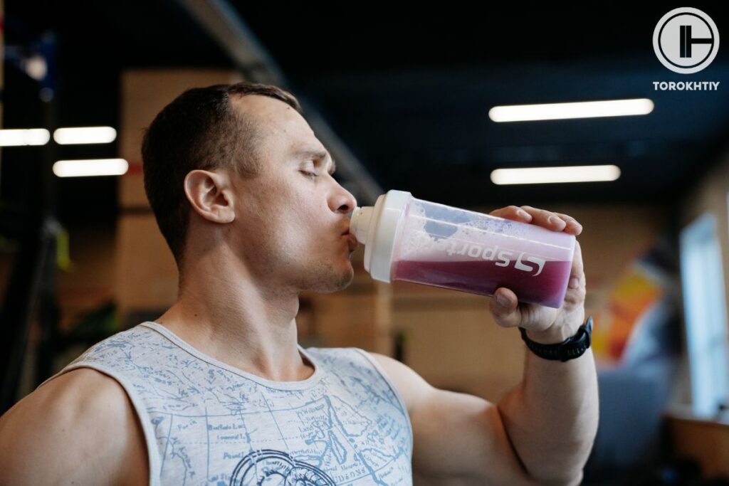 athlete drinks supplement shake
