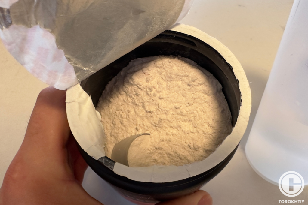 l-carnitine powder in a jar
