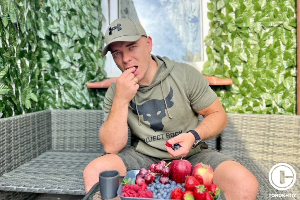 athlete eating berries