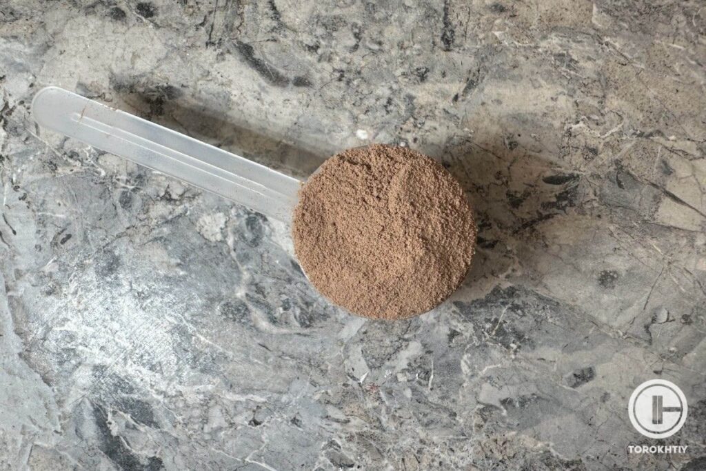 protein powder in scoop