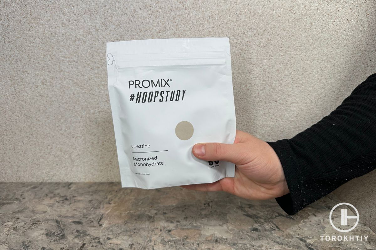 Promix Creatine Monohydrate in hand