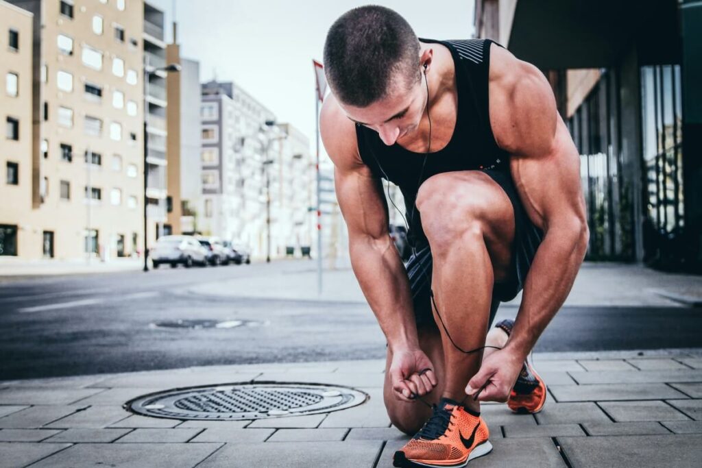 Bodybuilder Preparing To Run