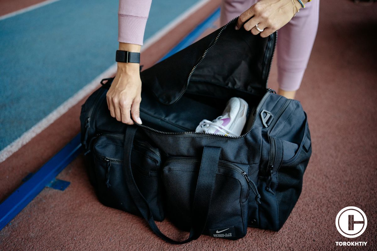 Athlete packs a gym bag