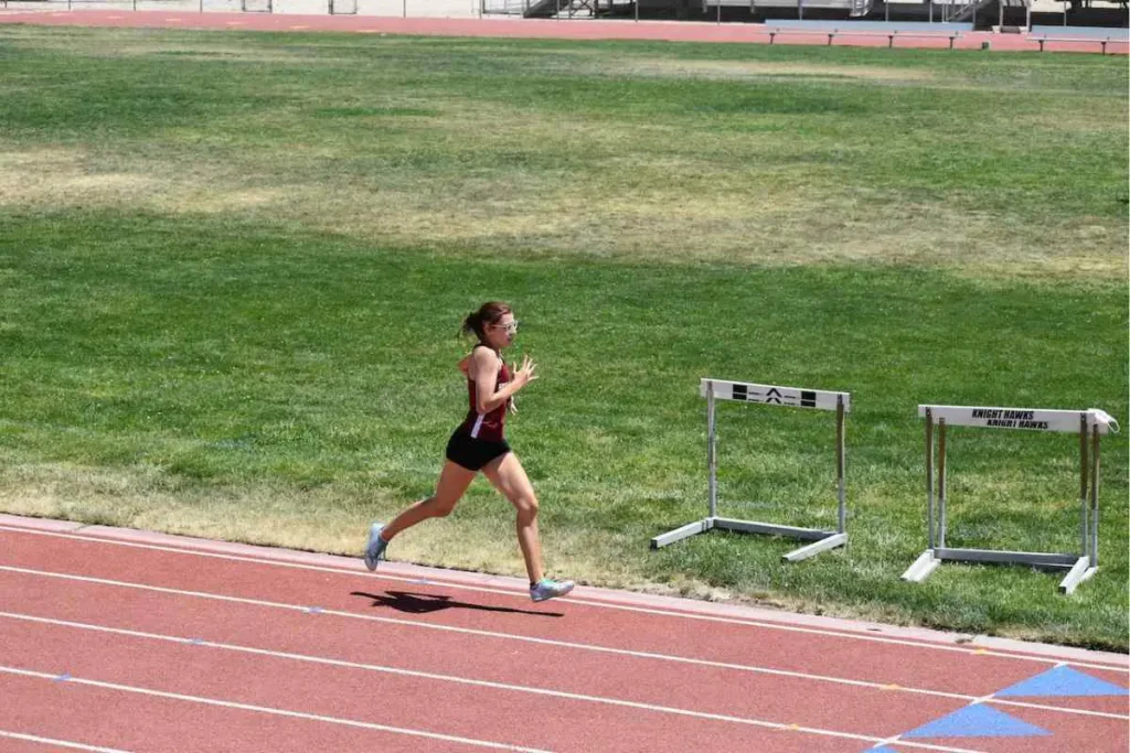 Female Running on the Synthetic Surface