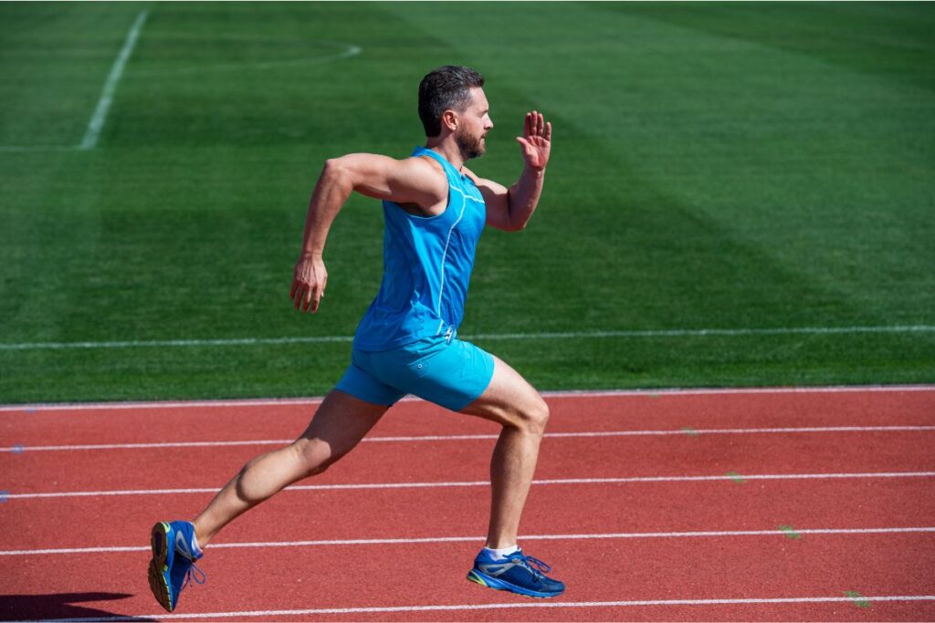 Bodybuilder Running Outside