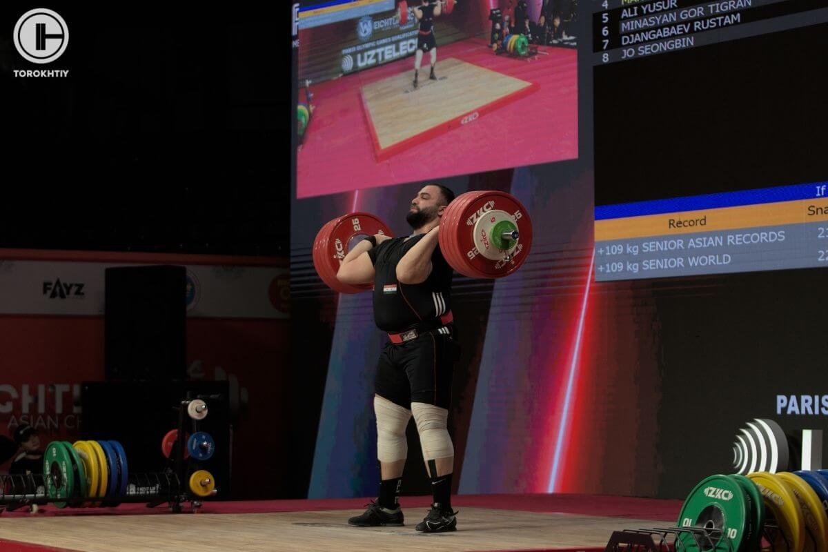 Man Asaad Lifting Barbell on Competition