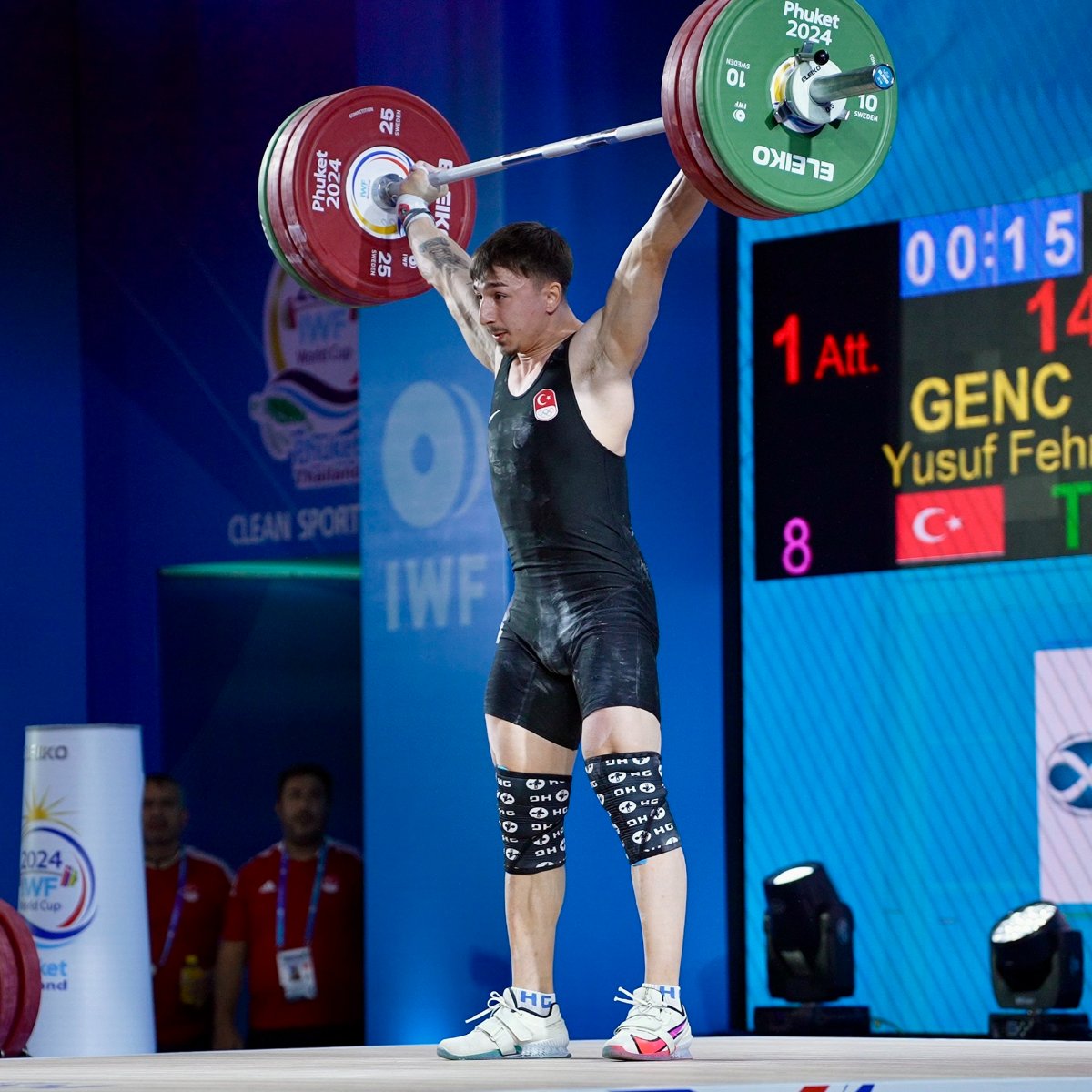 Weightlifter performing a clean and jerk.